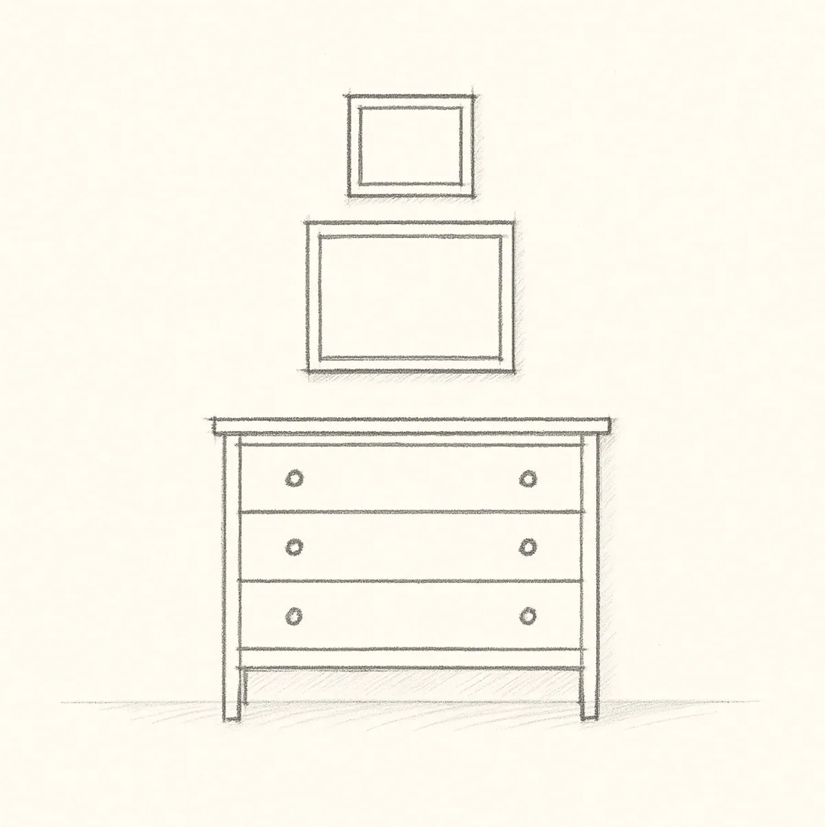 Sketch of two stacked frames hung above a chest of drawers