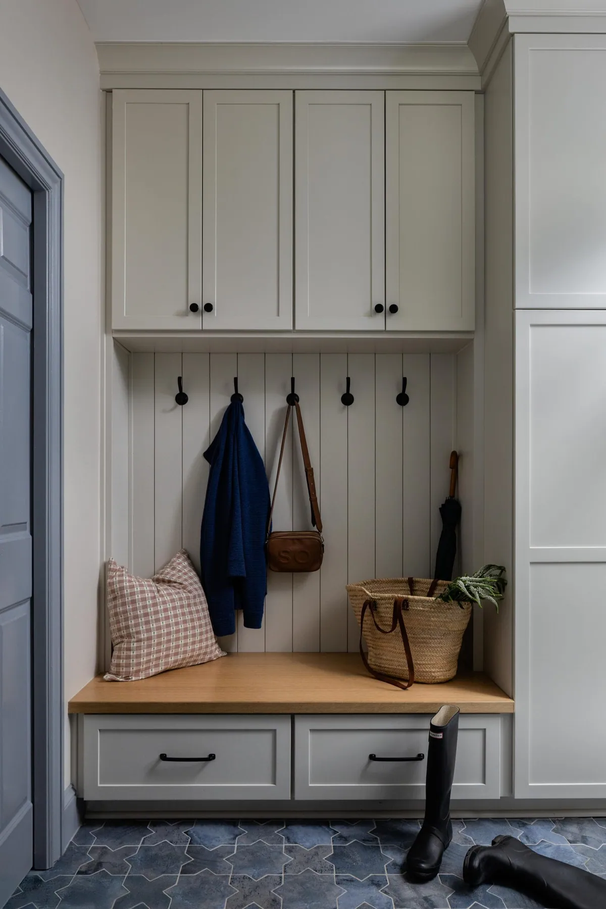 mudroom with built in bench and storage