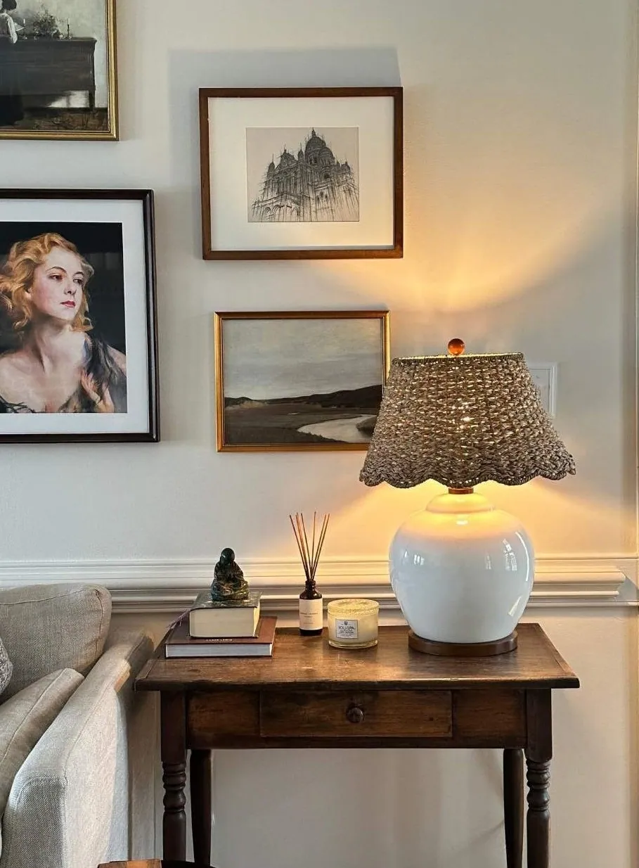 traditonal collected living room with antique side table
