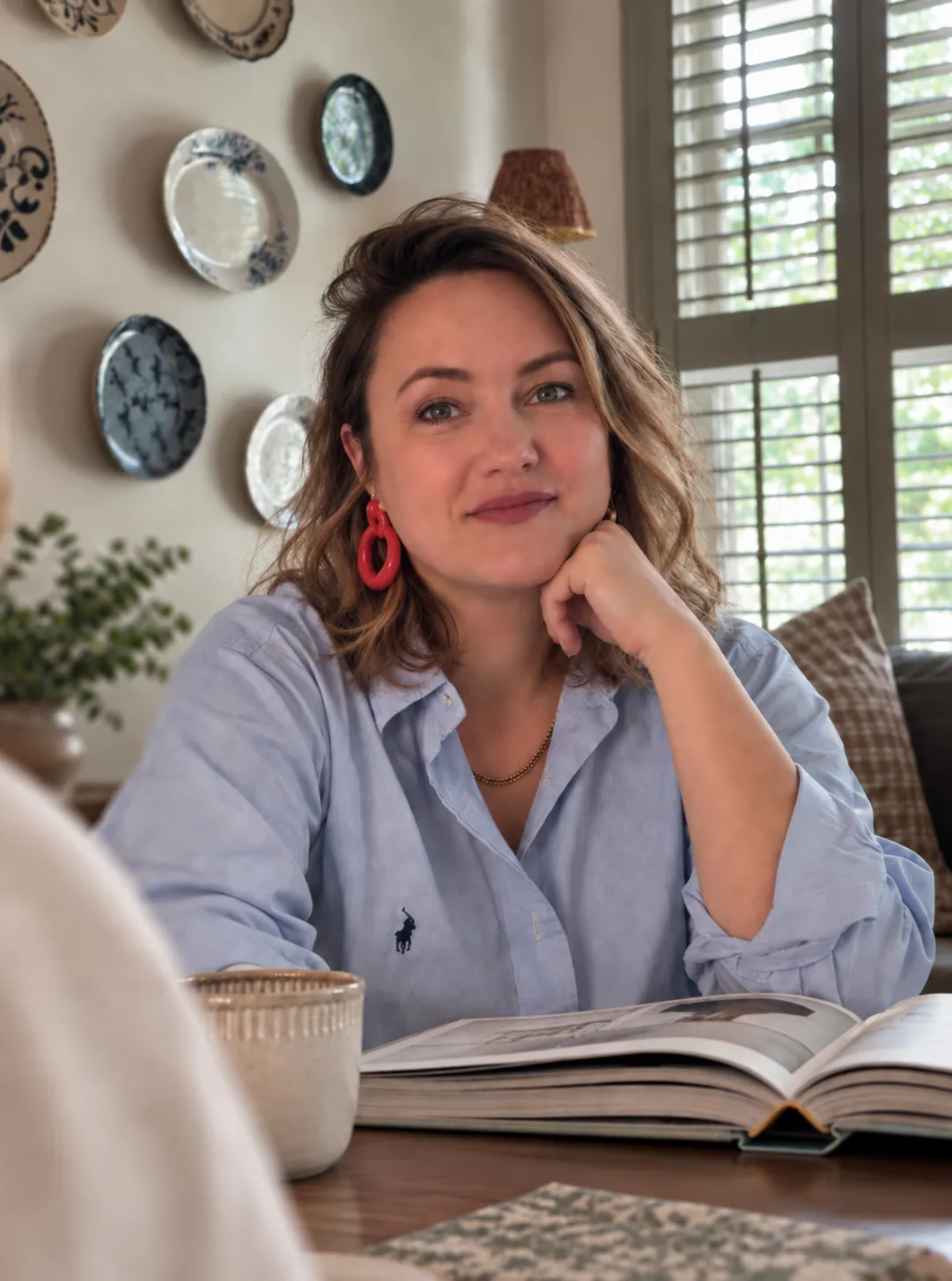Susanne Ordonez, founder and principal designer of House of Maevie, at her kitchen table
