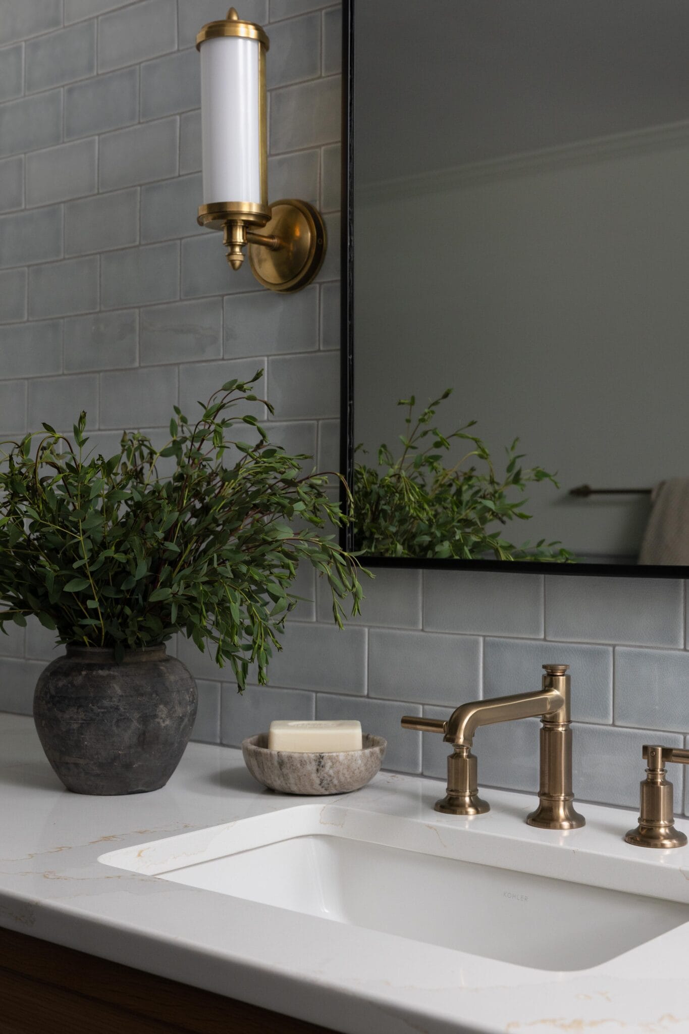 faucet and sink closet up in beautifully designed bathroom